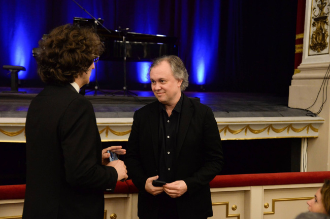 Alexey Shor at a concert hall during an event